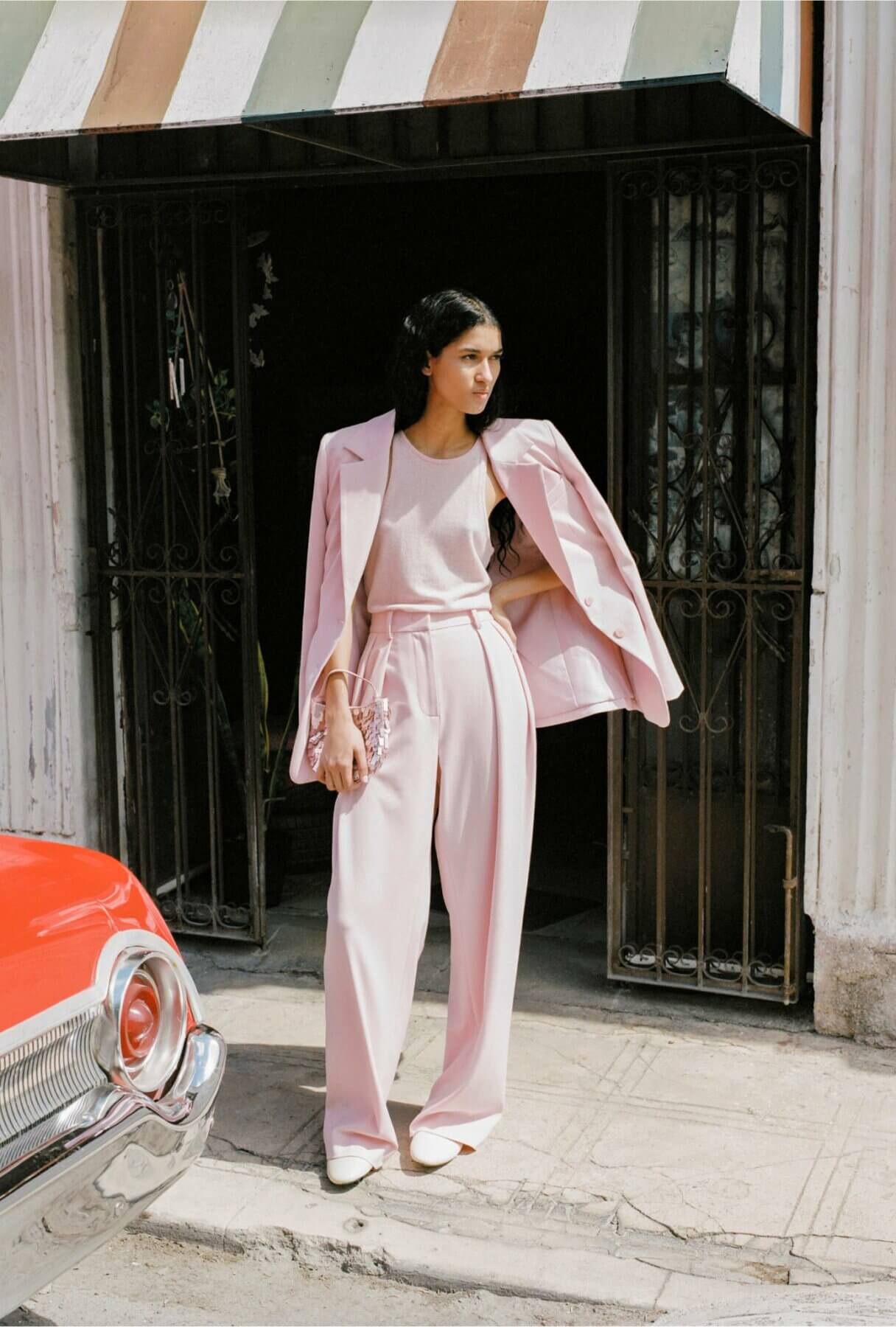 staud model pink suit on street